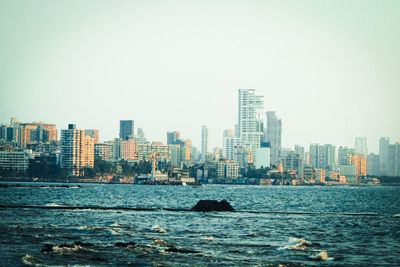 View of river with buildings in background