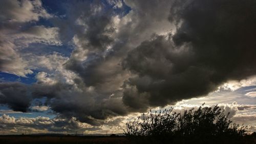 Storm clouds over landscape