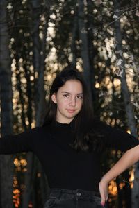 Portrait of a teenage girl in forest