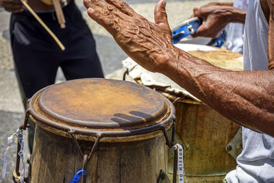 Musicians playing traditional instruments used in capoeira in pelourinho  in salvador, bahia