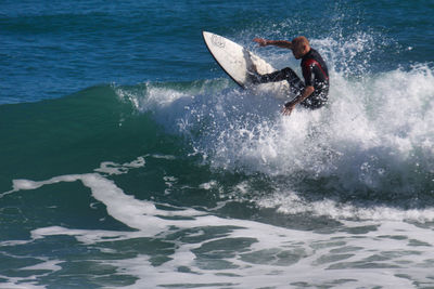 Man surfing in sea