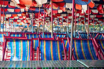 Multi colored flags hanging in amusement park