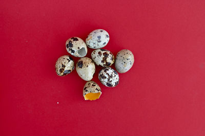 High angle view of heart shape on red table