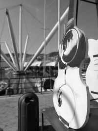 Close-up of coin-operated binoculars against sky