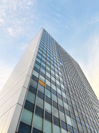 Low angle view of skyscraper against sky