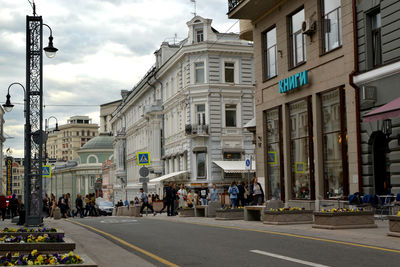 View of street in city against sky