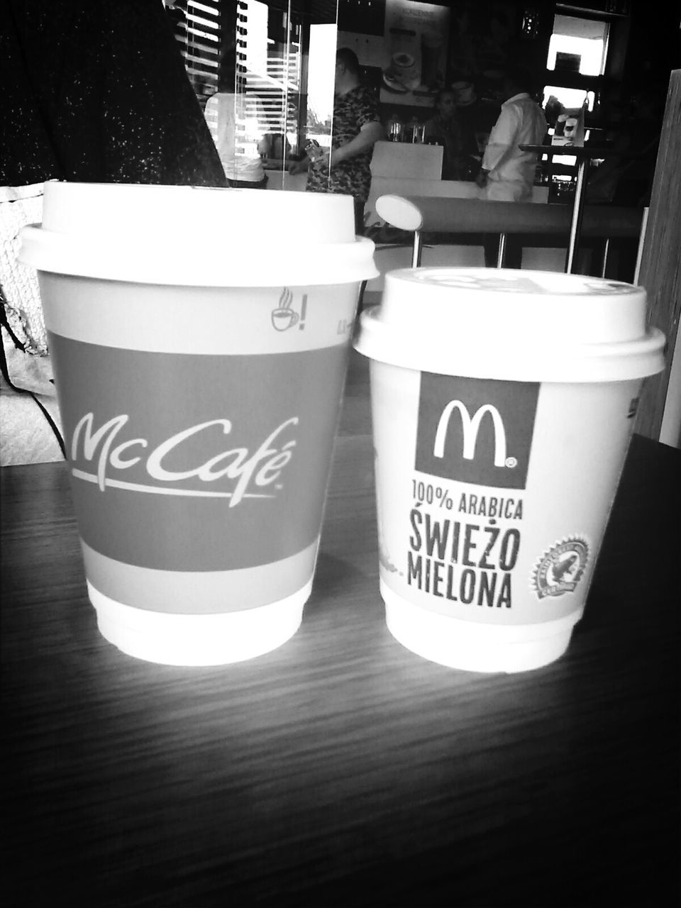 indoors, table, text, western script, food and drink, still life, communication, drink, close-up, refreshment, no people, coffee cup, high angle view, wood - material, freshness, book, coffee - drink, paper, empty, restaurant