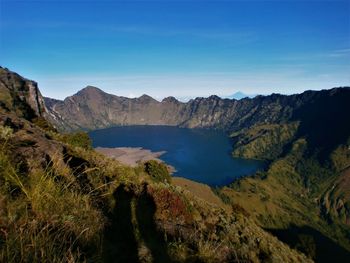 Segara anak is a lake in the crater of mount rinjani.