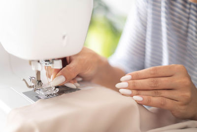 Cropped hand of person working in workshop