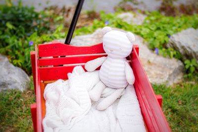 Close-up of toy on bench in park