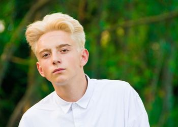 PORTRAIT OF YOUNG WOMAN