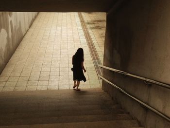Full length of woman walking on walkway