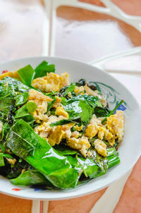 High angle view of salad in bowl on table