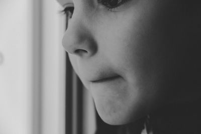 Close-up portrait of young man looking away