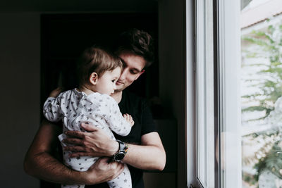 Woman looking at camera at home