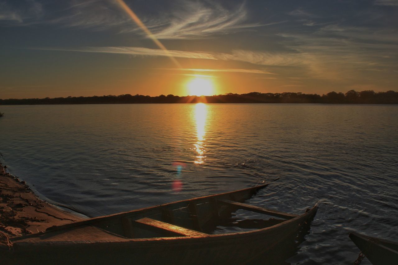 SCENIC VIEW OF SEA AGAINST ORANGE SKY