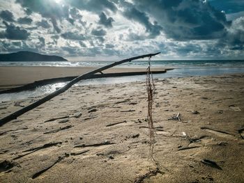 Scenic view of beach against sky