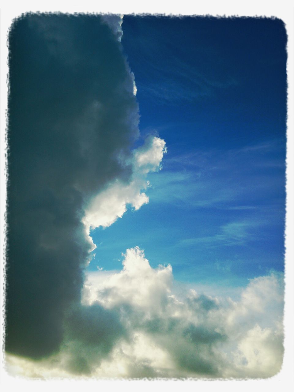 transfer print, sky, auto post production filter, cloud - sky, blue, low angle view, beauty in nature, scenics, tranquility, nature, tranquil scene, cloud, cloudy, sky only, cloudscape, idyllic, outdoors, day, no people, majestic