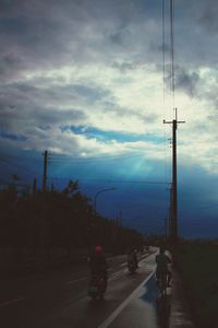 Road against cloudy sky