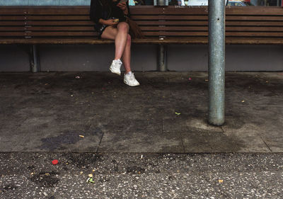 Low section of woman standing on floor