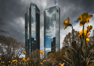 Low angle view of skyscrapers against sky