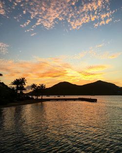 Scenic view of sea at sunset