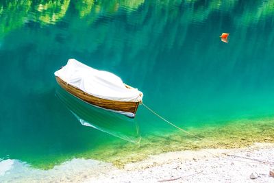 High angle view of boat moored in lake