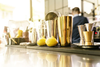 Close-up of kitchen utensils on table