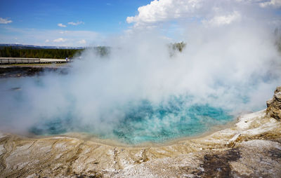 Scenic view of clouds over landscape