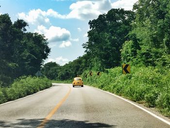 Country road passing through landscape