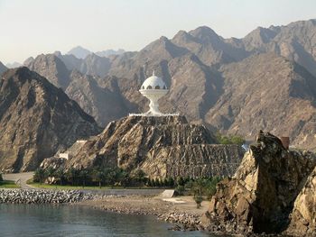 Panoramic view of rocks and mountains against sky