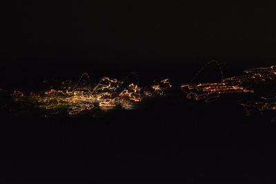 Illuminated cityscape at night