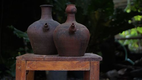 Close-up of old carving on table