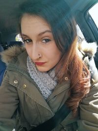 Portrait of woman in car