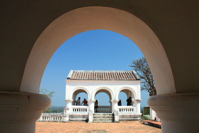 View of historic building against clear blue sky