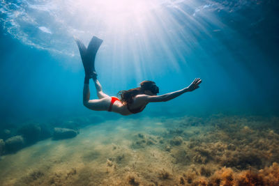 Man swimming in sea