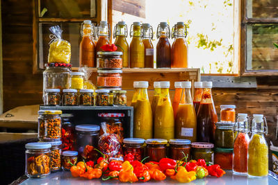 Close-up of bottles for sale