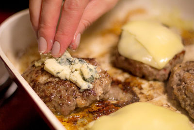 Close-up of person preparing food