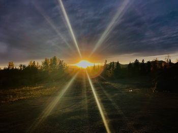Scenic view of landscape against sky during sunset