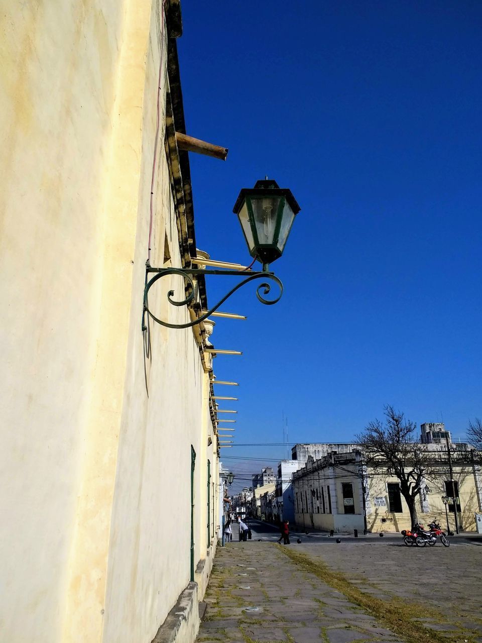 LOW ANGLE VIEW OF STREET LIGHT AGAINST SKY