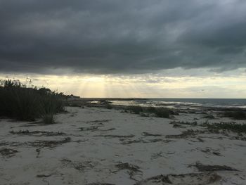 Scenic view of sea against sky during winter