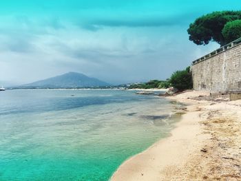 Scenic view of beach against sky
