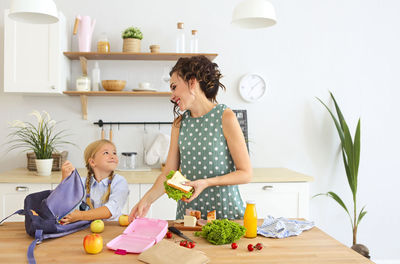 Woman preparing food on table