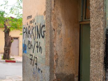 Close-up of text on wall