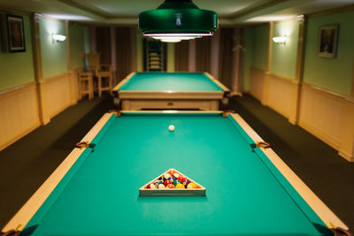 High angle view of man playing pool