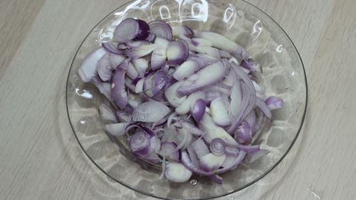 High angle view of chopped vegetables in bowl on table