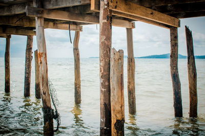 Underneath view of pier in sea