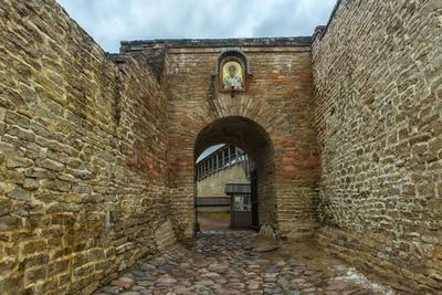 Entrance of historic building against sky