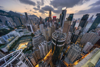 High angle view of modern buildings in city against sky