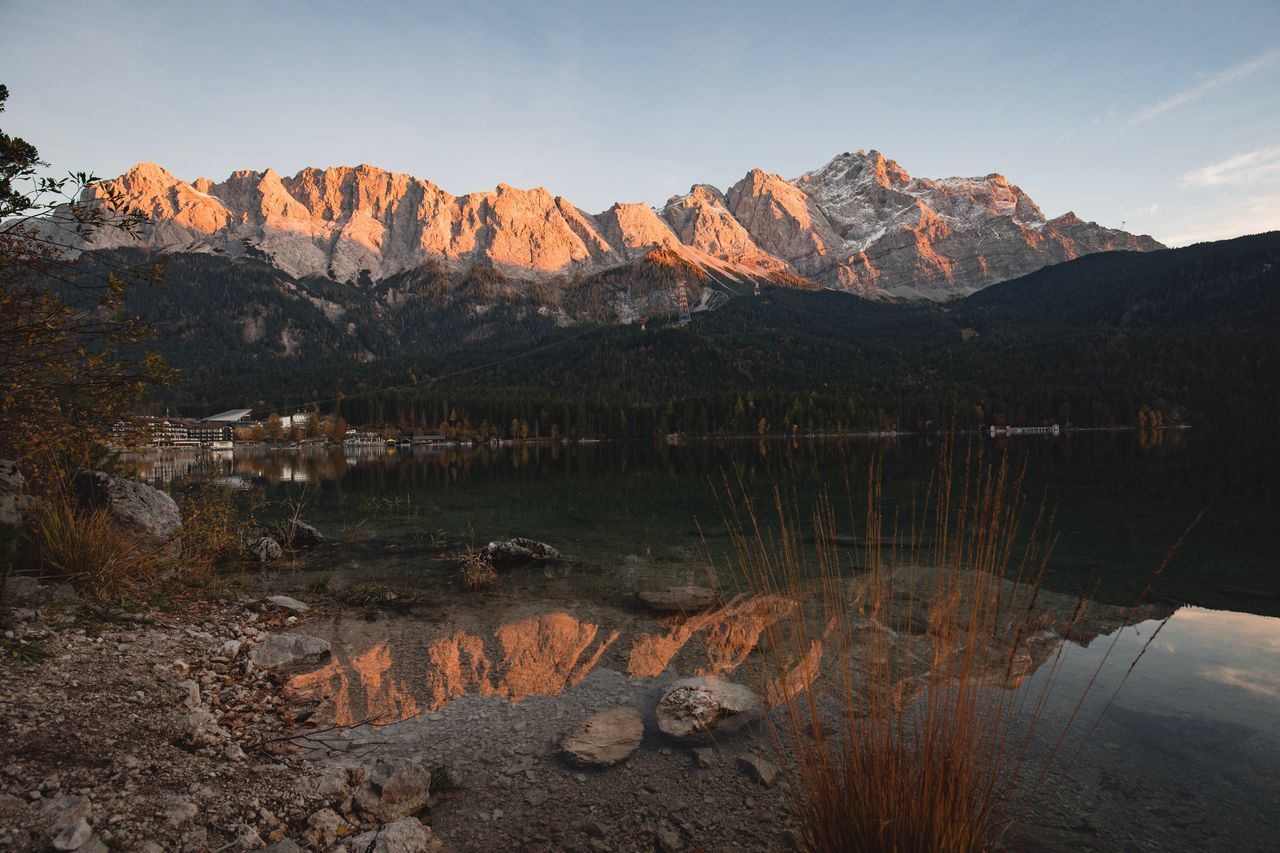 water, mountain, scenics - nature, beauty in nature, sky, tranquility, rock, solid, non-urban scene, tranquil scene, rock - object, nature, lake, no people, mountain range, reflection, day, idyllic, physical geography, outdoors, formation